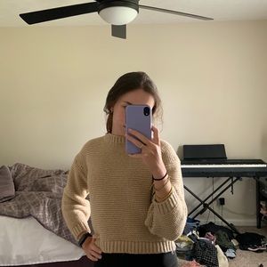 Very cozy creamy sweater. soft and very very warm.